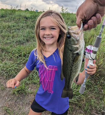 Raising our little girl to do it all. 🎀 #firstfish #fishing #babygirl